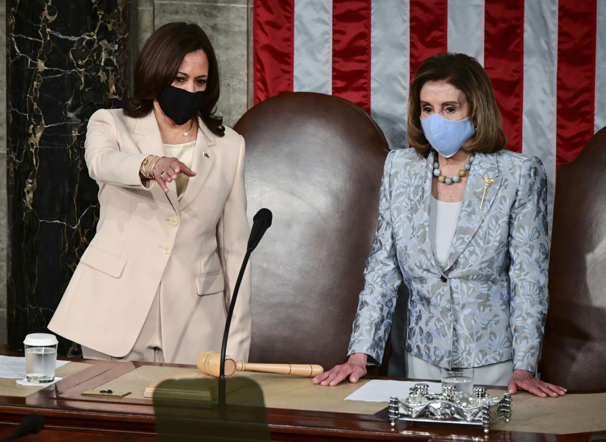 Harris, Pelosi make history seated behind Biden at speech