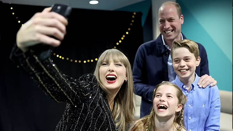 Prince William, Prince George and Princess Charlotte pose for a selfie with Taylor Swift